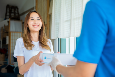 woman getting medication delivered